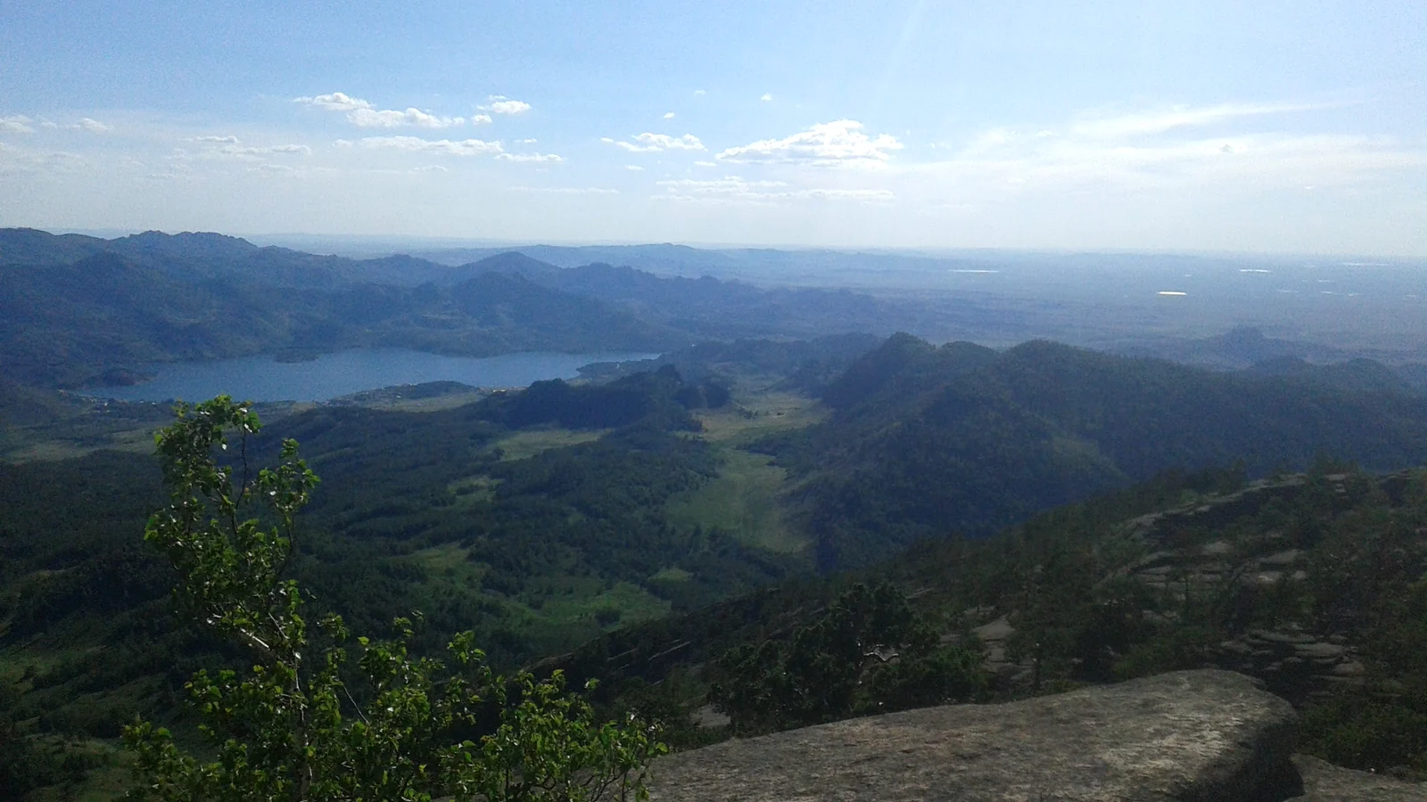 Lake Jasybay and forested hills seen from Akbet in Bayanaul National Park