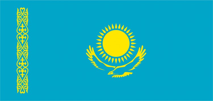 Official image of Kazakhstan's state flag with a sky-blue field, gold sun and eagle, and vertical gold ornament at the hoist