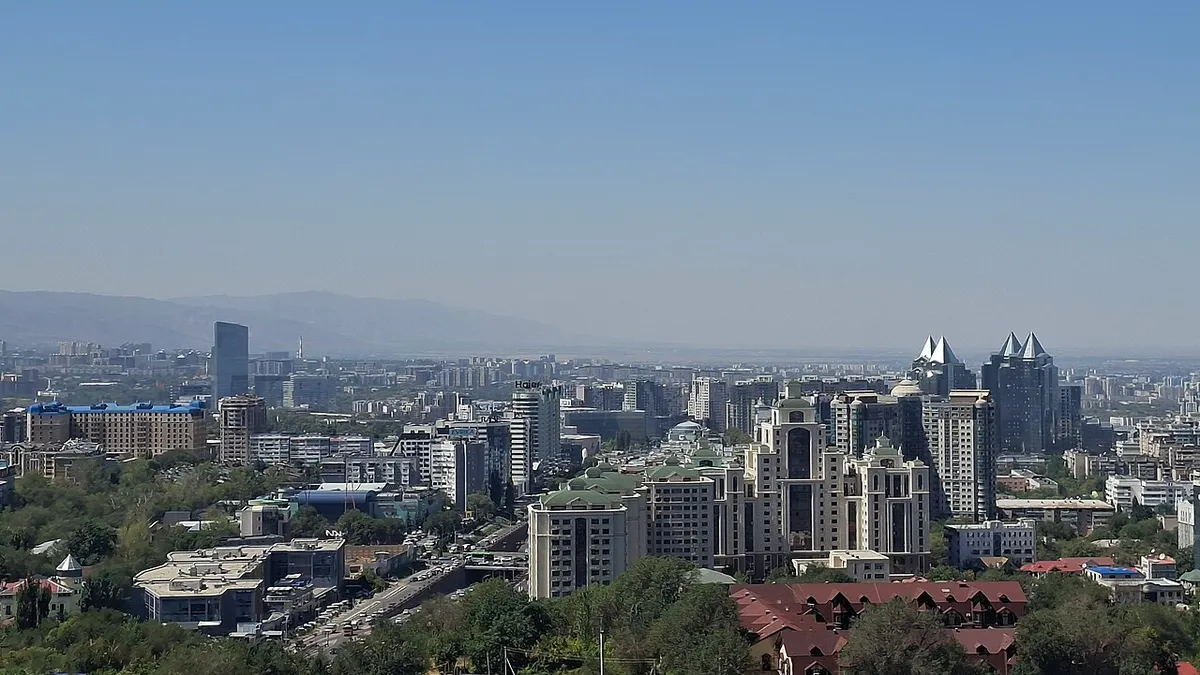 Panoramic view of Almaty city with Tian Shan mountains in the background