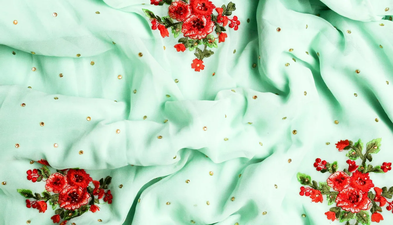 Kazakh man and woman wearing traditional national clothing — chapan robe and colorful dress