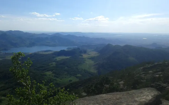 Lake Jasybay and forested hills seen from Akbet in Bayanaul National Park