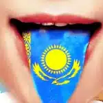 Image of a person sticking out their tongue, which is overlaid with the flag of Kazakhstan, symbolizing the Kazakh language. A map of Kazakhstan is visible in the background, highlighting regions of the country.